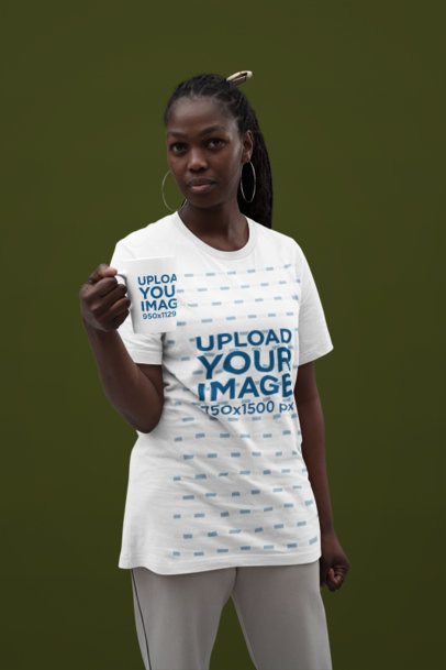 Bella Canvas T-Shirt Mockup of a Woman Posing in a Studio With a 15 Oz Coffee Mug