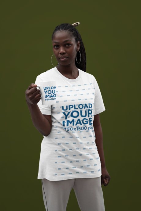 Bella Canvas T-Shirt Mockup of a Woman Posing in a Studio With a 15 Oz Coffee Mug