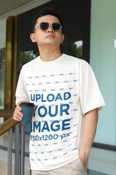 Crewneck Tee Mockup Featuring a Man with Sunglasses Holding a Drink