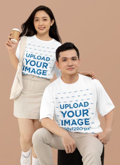 Simple Mockup Featuring a Couple Wearing Matching T-Shirts in a Studio