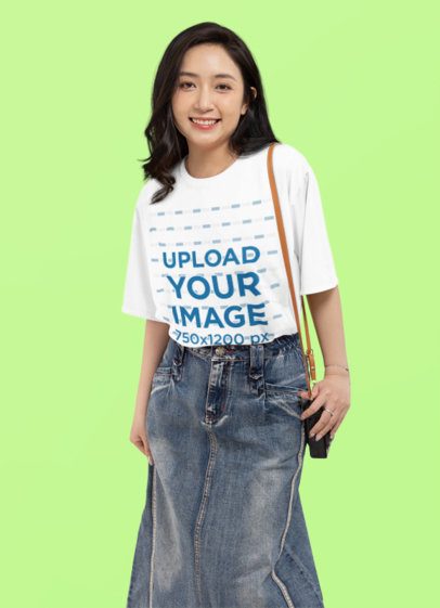 Mockup of a Smiling Woman Wearing a T-Shirt with a Rounded Neck in a Studio