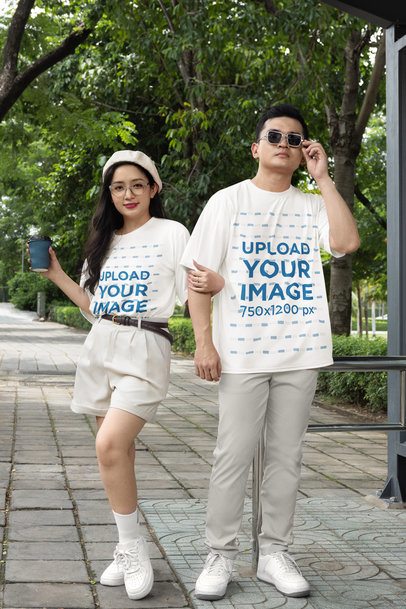 Crewneck T-Shirt Mockup of a Stylish Man and a Woman in Matching Outfits