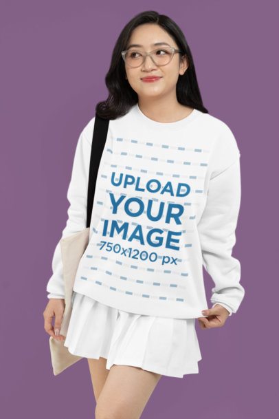 Mockup of a Woman Wearing Glasses and a Rounded-Neck Sweatshirt in a Studio