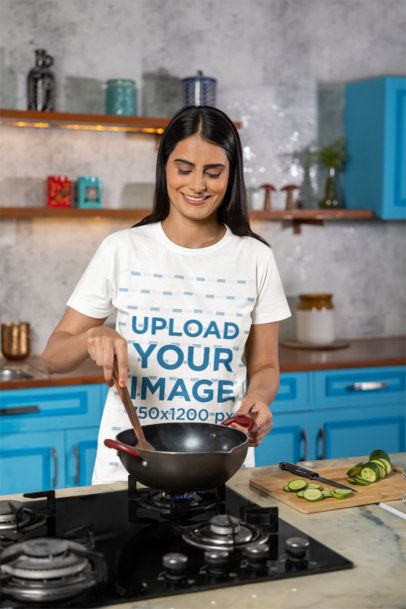 Cooking Mockup of a Cheerful Woman Wearing a Round-Neck Scott International T-Shirt