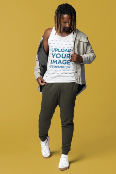 Bella Canvas Tank Top Mockup of a Man Wearing a Jacket in a Studio