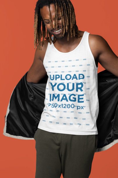 Bella Canvas Tank Top Mockup Featuring a Bearded Cheerful Man Taking Off His Jacket in a Studio m40828