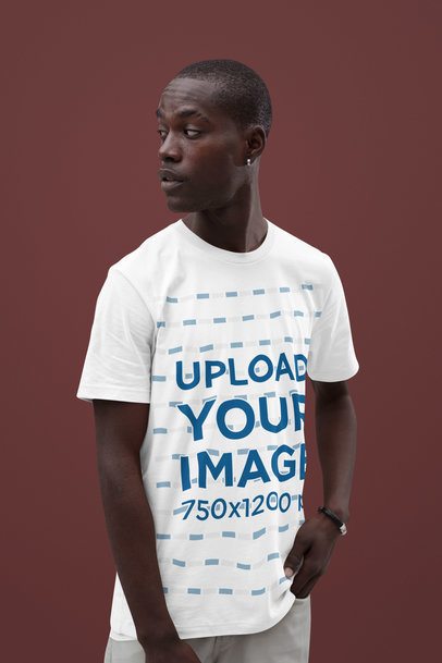 Simple Mockup of a Man Wearing a Bella Canvas Tee Against a Solid Background