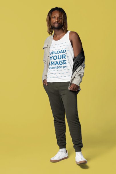 Mockup of a Man in a Jacket Wearing a Bella Canvas Tank Top in a Studio