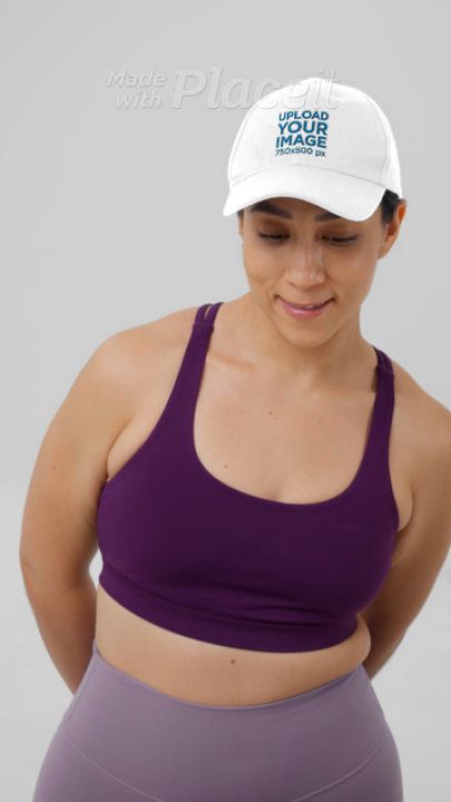 Dad Hat Video Featuring a Smiling Woman in a Fitness-Styled Outfit