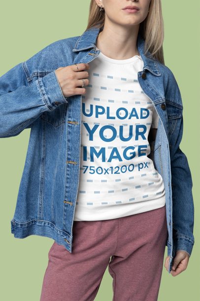 Mockup of a Cropped-Face Woman Wearing a Bella Canvas T-Shirt With a Denim Jacket m40839