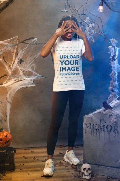 Bella Canvas Tee Mockup of a Scared Woman in a Halloween-Decorated Setting