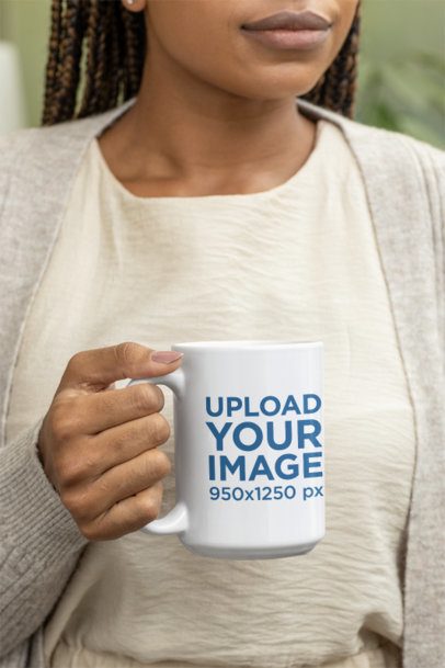 Mockup of a Woman Grabbing a 15 oz Coffee Mug