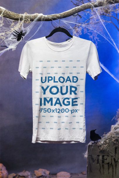 Halloween-Themed Mockup of a Bella Canvas Tee Hanging from a Branch with Spider Webs m51280