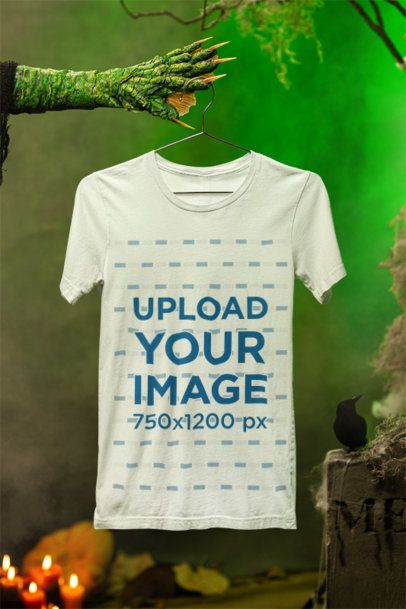 Halloween-Themed Mockup of a Horror Creature Holding a Bella Canvas T-Shirt m51285