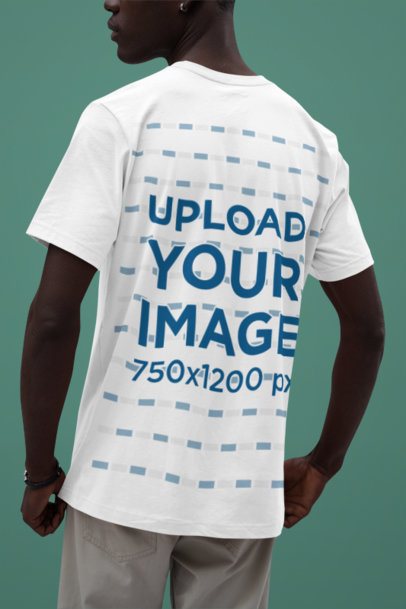 Back-View T-Shirt Mockup of a Man Featuring a Man Standing Against a Solid Background