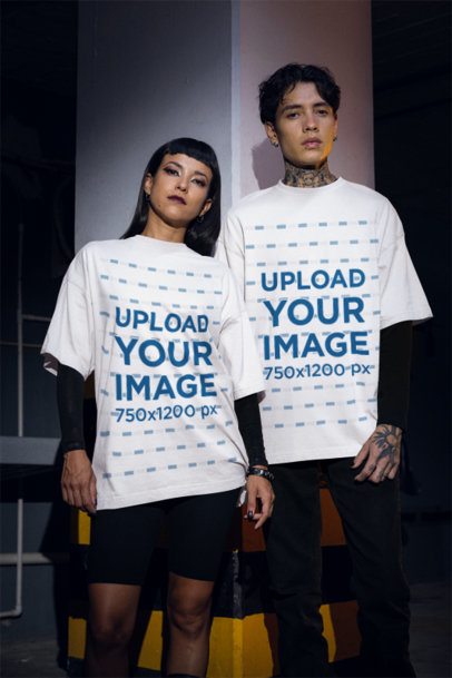 Oversized T-Shirt Mockup Featuring a Woman and a Tattooed Man With Grunge Styles