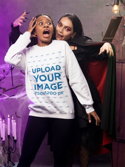 Halloween-Themed Mockup of a Woman in a Sweatshirt Getting Bitten by Dracula m51255