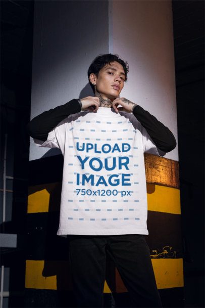 Oversized T-Shirt Mockup of a Man Wearing a Gothic-Style Outfit m50780