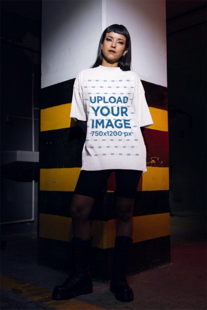 Mockup of a Woman Wearing an Oversized T-Shirt for a Grunge-Style Look