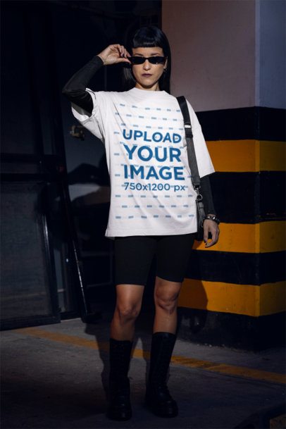 Mockup of a Woman Wearing an Oversized Tee for a Gothic-Inspired Look m50783
