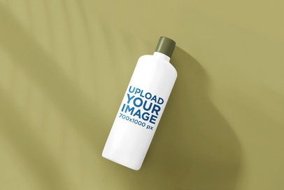 AI-Created Mockup Featuring a Shampoo Bottle Lying on a Colorful Background m50632