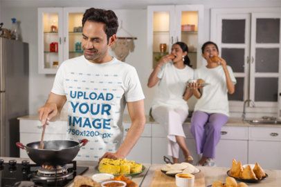 Scott International T-Shirt Mockup of a Smiling Man Cooking With His Family