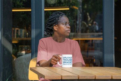 11 oz Coffee Mug Mockup Featuring an Elderly Woman Sitting at the Table m51503