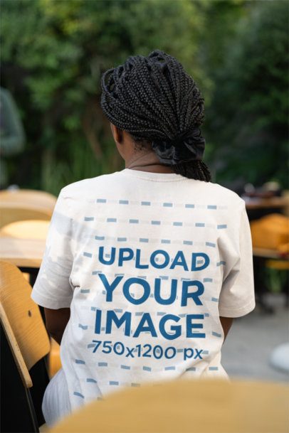 Back-View Mockup of a Woman With Locs Wearing a Bella Canvas T-Shirt