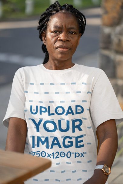 Mockup of an Elderly Woman Wearing a Rounded-Neck T-Shirt from Bella Canvas