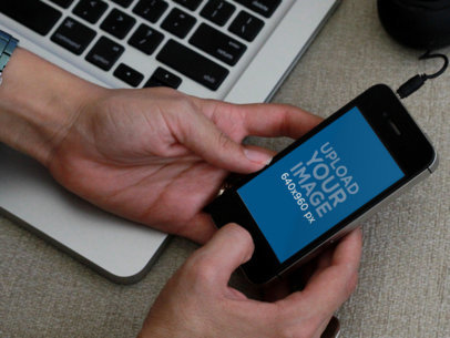 Mockup of an iPhone 4 Being Held by Man 