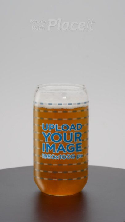 Spinning Video Featuring a Can Glass Filled With Beer 9002v