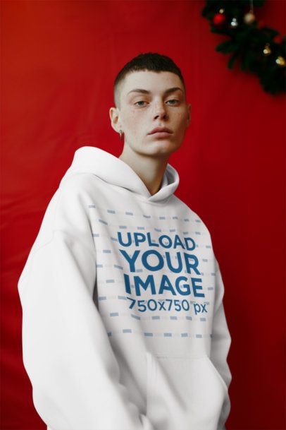 Pullover Hoodie Mockup of an AI-Generated Woman With an Alternative Style and a Xmas Theme