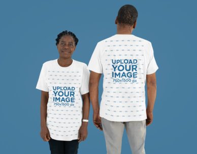 Bella Canvas T-Shirt Mockup Featuring an Elderly Couple Standing Next to Each Other