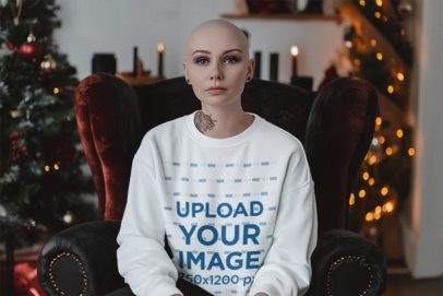 Alternative Xmas Mockup Featuring an AI-Created Tattooed Woman With a Sweatshirt