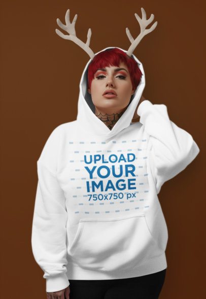 Pullover Hoodie Mockup of an AI-Generated Tattooed Woman With Reindeer Ears m51673