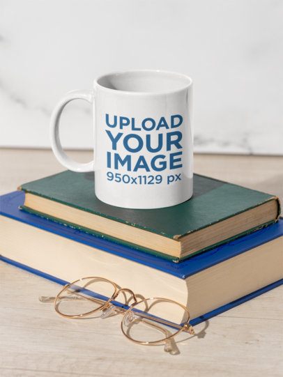 Sublimated Mockup Featuring an 11 Oz Coffee Mug Placed on a Pile of Books m51016