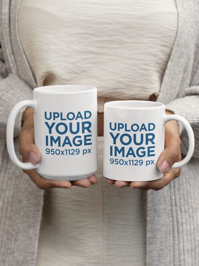 Mockup Featuring Woman's Hands Holding Two Sublimated Coffee Mugs