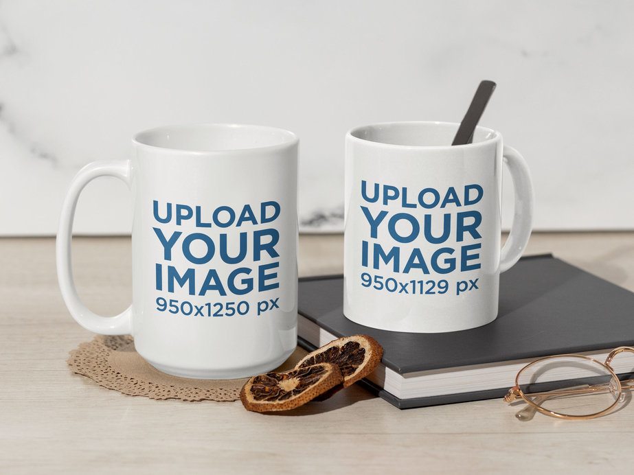 Placeit - Mockup of an 11 Oz and 15 Oz Coffee Mugs Placed in a Table With a  Pair of Glasses and a Book