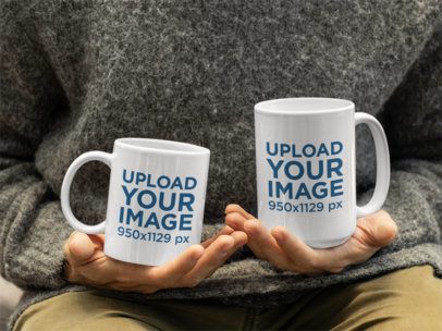 Drinkware Mockup Featuring a Person Holding Coffee Mugs in Each Hand