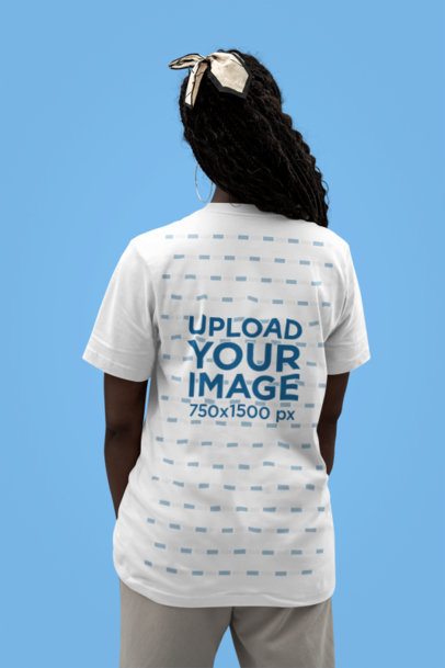 Back-View Mockup of a Woman Wearing a Bella Canvas T-Shirt and a Cute Bow