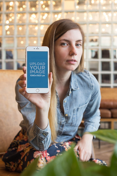 Mockup of a Woman Showing her Rose Gold iPhone