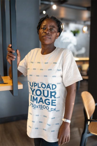Mockup Featuring an Elderly Woman Wearing a Crewneck T-Shirt from Bella Canvas