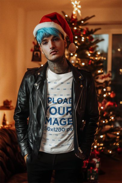 AI-Generated Mockup of a Tattooed Man Wearing a Tee in Front of a Christmas Tree