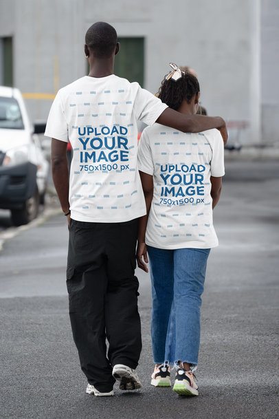 Back-View Bella Canvas Tee Mockup Featuring a Man and a Woman Walking Together 