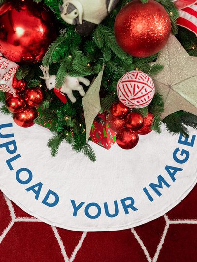 Holiday-Themed Mockup Featuring a Christmas Tree Skirt With Some Decorations m52067