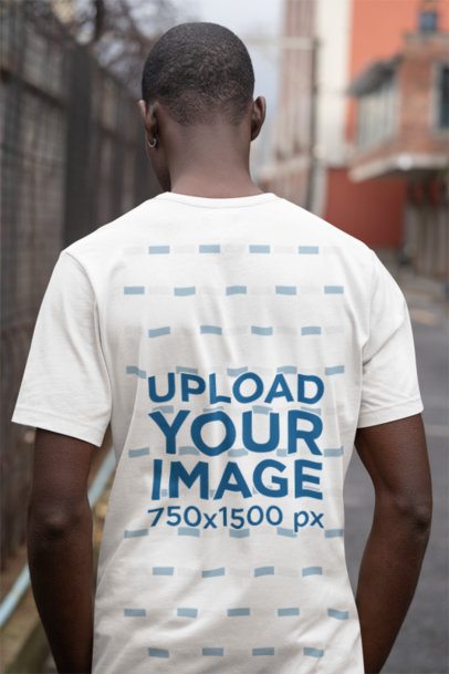 Back-View Bella Canvas Tee Mockup of a Man Walking on the Street