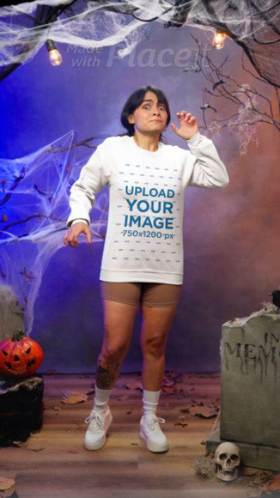 Gildan Sweatshirt Video Featuring a Woman With a Scary Look in a Halloween Set