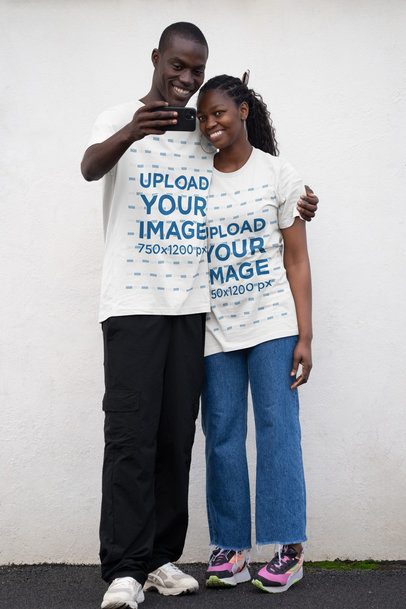 Bella Canvas T-Shirt Mockup of a Smiling Couple Taking a Selfie Together