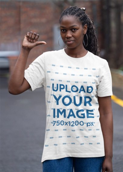 Mockup of a Woman Pointing at Her New Bella Canvas Round-Neck Tee