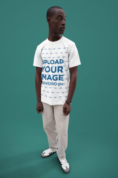 Mockup of a Man Wearing a Short-Sleeve T-Shirt from Bella Canvas in a Studio